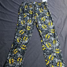 Nwt Men's Batman Pajama Pants Size Xl Men's Lightweight Pj Pants, Brand New Never Worn. Batman Symbols And Black And Gray Skull Pattern. Elastic Waist And Adjustable Ties. Super Soft And Roomy. Please Review All Photos Carefully And Don't Hesitate To Ask For Any Clarification Or Additional Photos. All Measurements Are Flat Then Doubled & Approximate. Waist- 32 In (Unstretched) Rise- 14.5 In Length- 44 In Open To Offers! For Your Protection And Mine, I Videotape & Photograph Orders As They Are Pa Yellow Loungewear Pants, Batman Pajama Pants, Batman Symbol, Pj Pants, Mens Pajamas, Yellow Black, Black N Yellow, Elastic Waist, Pajama Pants