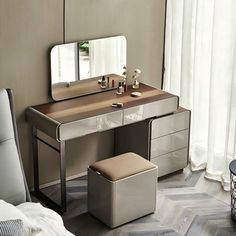 a bedroom with a vanity and stool next to a window