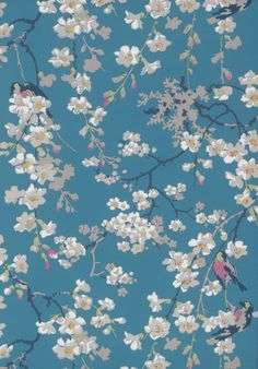 a blue background with white flowers and birds