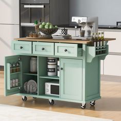 a kitchen island with an open shelf on wheels