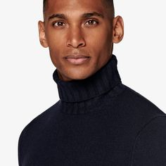 A versatile shade meets a classic winter style in this luxurious navy turtlneck sweater-wear it on its own or pair it with a jacket for a casually refined take on seasonal styling. Navy Fine Knit Sweater For Fall, Formal Winter Turtleneck Sweater, Formal Turtleneck Sweater For Fall, Elegant Turtleneck Polo Sweater For Winter, Elegant Winter Turtleneck Polo Sweater, Elegant Navy Sweater For Fall, Classic Navy Polo Sweater For Winter, Classic Winter Turtleneck Polo Sweater, Elegant Winter Business Sweater