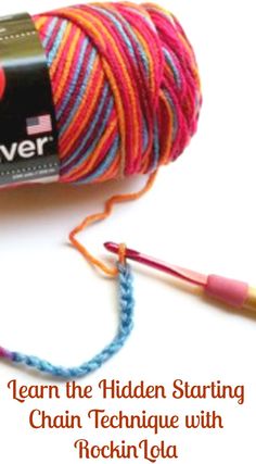 a ball of yarn and crochet hooks with the words learn the hidden starting chain technique