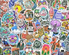 an assortment of stickers are shown on a wall in this image, there is no image here to provide a caption for