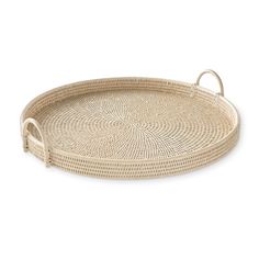 an oval rattan tray with handles