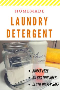 the homemade laundry detergent is sitting on top of a white table with yellow towels