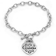 A lovely gift idea for the person who’s always been there for you. Designed with high polish oxidized stainless steel  this beautiful bracelet features an engraved heart shaped charm with your choice of “Mom”  “Nana”  “Grandma”  “Sister” or “Daughter.” This statement piece secures with a trendy toggle clasp. Show her how much you care with this gorgeous accessory! Mother's Day Engraved Stainless Steel Name Bracelet, Everyday Stainless Steel Heart Bracelet With Charm, Silver Heart Name Bracelet For Personalized Gift, Personalized Silver Name Bracelet With Heart Shape, Silver Heart-shaped Name Bracelet For Personalized Gift, Silver Personalized Heart Bracelet, Personalized Silver Stainless Steel Heart Bracelet, Personalized Heart-shaped Name Bracelet In Silver, Personalized Silver Heart Name Bracelet