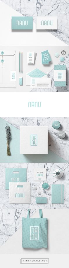 an assortment of stationery and business cards with the name nanu in white on blue