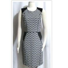 This Is A Stunning Black And White Chevron Striped Stretch Blend Fully Lined Tailored Empire Waist Sleeveless Just Above Knee Length Dress By H & M Hennes Mauritz. It Is Brand New, In Perfect Condition And A Size 10. The Fabric Is 64% Polyester, 32% Viscose And 4% Elastane. It Is Fully Lined With 100% Polyester. It Is Machine Washable. The Bust Measures 36 Inches, The Empire Waist Measures 30 Inches, The Hips Measure And The Length From Top Hem Is 37 Inches. Original Retail $99. H&m Black Sleeveless Dress, Chic Sleeveless Mini Dress By H&m, Chic Sleeveless Dress By H&m, Chic Sleeveless H&m Dress, Striped Sleeveless Dress, Chevron Stripe, Hm Dress, Knee Length Dress, Above Knee