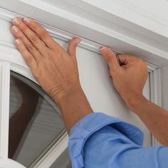 Vinyl Bulb compresses against door to form a weather tight seal. Seals gaps up to 1/4-in. 3M Adhesive makes installation easy; simply measure, trim, peel and stick. All season protection against drafts, moisture, dust and insects. Includes vinyl connector used to combine two 42-in pieces for side of door. Trim to fit with a hacksaw. Fits a door up to 36-in wide. M-D 7-ft x 1-in x 1/2-in White Cinch Top and Sides Door Jamb Kit Aluminum/Vinyl Door Weatherstrip | 43304 Tommy Bahama Living Room, Installing Exterior Door, Concrete Interior Design, L Shaped Bar, Antique Iron Beds, Floral Bedspread, Vinyl Doors, Concrete Fireplace, Door Jamb