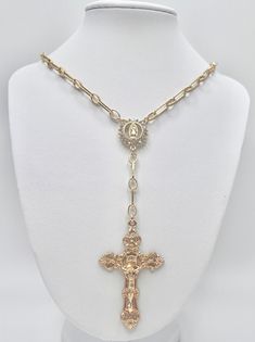 14k gold filled chain with large gold plated cross pendant and Swarovski crystal Our Lady connector. Necklace is 22 inches total length (including 2 inch extender). The cross pendant is 1.75 inches in length. Gold-tone Cross Jewelry With Adjustable Chain, Gold Chain Jewelry With Cross Pendant, Gold-plated Cross Necklace With Adjustable Chain, Gold Plated Cross Necklace With Adjustable Chain, Adjustable Crucifix Chain Jewelry, Gold Cross Chain Necklace With Adjustable Chain, Gold Cross Necklace With Adjustable Chain, Cross Pendant Necklace, Gold Filled Chain