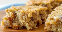 some food is sitting on a plate and has been cut in half to show it's crumbs