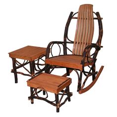 a wooden rocking chair with two small stools