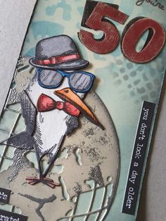 a close up of a money bill with a bird wearing glasses and a hat on it