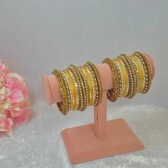 This includes 2 half stacks of golden bangle set with antique gold mixed gold dot metal bangles.  Avialable in 12 different colours to choose from ✨ Ready to ship 📦 Yellow Bracelets For Party And Festivals, Adjustable Yellow Bangle For Festivals, Festive Yellow Bangle Jewelry, Festive Yellow Bangle Bracelet, Festive Gold Beaded Bangle Bracelets, Gold Beaded Bangle Bracelet For Celebration, Adjustable Yellow Bangle For Festive Occasions, Festive Adjustable Yellow Bangle, Yellow Bangle For Festivals And Gifts