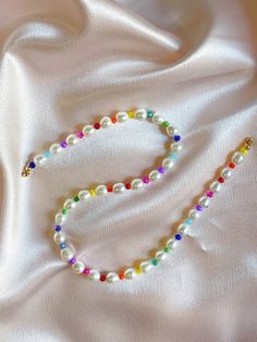 Colorful Pearl Jewelry, Rainbow Jewelry Aesthetic, Rainbow Jewelry Diy, Rainbow Pearl Charm Jewelry, Rainbow Pearl Jewelry With Pearl Charm, Multicolor Single Strand Pearl Necklace, Rainbow Pearl Necklace With Colorful Beads As Gift, Rainbow Pearl Beaded Necklace As A Gift, Multicolor Pearl Spacer Beads