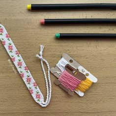 some crafting supplies are laid out on a table