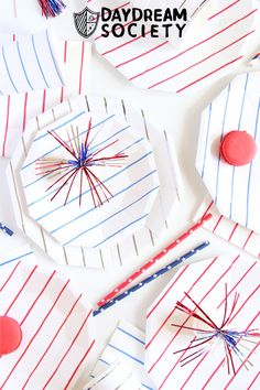 patriotic paper plates with red, white and blue thread sprinkles on them