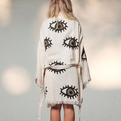 Embrace the timeless style of the Eye of The Beholder kimono kaftan! With its 100% organic cotton and evil eye motif, it's the perfect cover-up for all your summer needs. Stay cool, comfy, and breezy, whether you're beach-bound, exploring the park, or lounging at home. Featuring a soft, light, and fluffy construction with an adjustable waist belt, this wardrobe essential is just what you need! One Size Fits Most Cotton Beachwear Robe For Loungewear, Cotton Robe For Beachwear And Loungewear, Oversized Cotton Cover-up For Summer, Oversized Cotton Casual Robe, Hippie Summer Kimono For Loungewear, Summer Hippie Kimono For Loungewear, Hippie Style Summer Kimono For Loungewear, Summer Hippie Style Kimono For Loungewear, Summer Hippie Cotton Kaftan