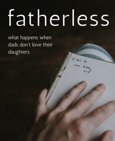 a person holding an open book with the words fatherless written on it in front of them