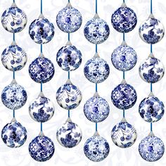 blue and white ornaments are hanging from strings