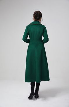 "This stunning dark green wool coat for womens is beautifully fitted and tailored for a classic, feminine design. There is a brooch decoration on lapels.The long wool coat features dark green, a slim fitting bodice with long sleeves and fitted waist leading into a long,flowing skirt coat. Details : * dark green wool blend fabric with polyester lining * two pockets * button closure in front * lapel collar * long sleeves * brooch decoration * winter coat, spring coat, womens coat * mid calf length Elegant Green Wool Outerwear, Elegant Green Double-breasted Pea Coat, Elegant Green Outerwear For Office, Elegant Green Office Outerwear, Elegant Green Wool Coat For Winter, Elegant Green Wool Coat For Fall, Elegant Green Wool Coat, Elegant Green Pea Coat For Winter, Elegant Green Long Wool Coat