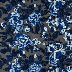 blue and white flowers on grey fabric