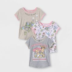 Help your toddler flaunt their favorite movie with this 3-Pack of Short-Sleeve Toy Story T-Shirts. Cut in a classic silhouette and crafted from a soft fabric blend, these graphic tees help them stay cool and comfy all day. The pack includes three short-sleeve tees — one featuring an illustration of Buzz Lightyear on an oatmeal background, one adorned with an allover print of different Toy Story characters, and one in a gray hue with an illustration of Bo Peep and Woody — to bring fun flair to th Playful Soft-washed Tops For Playtime, Playtime Graphic Tee With Character Print, Graphic Tee With Character Print For Playtime, Graphic Tee Tops With Character Print For Playtime, Themed Cotton Short Sleeve Tops, Themed Short Sleeve Tops For Playtime, Bo Peep And Woody, Toddler Girl Toys, Toy Story Characters