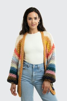 Discover our best-selling Rainbow Knit Cardigan! This oversized open-front cardigan features chunky knit sleeves and vibrant stripes for a playful pop of color. This comfy sweater is perfect for layering over jeans or leggings for a lively and stylish fall look. Material: 100% Acrylic Length: 28.5" Width: 22.5" Hand Wash Multicolor Cardigan, Stripe Crochet, Adorable Style, Autumn Wardrobe, Cozy Cardigan, Knit Sleeve, Comfy Sweaters, Oversized Cardigan, Sweaters And Leggings