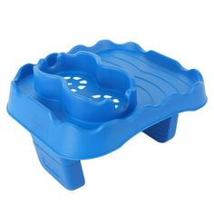 a blue plastic tray with holes in it