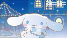 a white rabbit holding a blue scarf in front of a building with lights on it