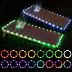 some lights that are laying on the ground in the grass with circles around them and one is