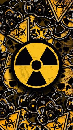 an image of a radioactive sign on a black and yellow background with skulls around it