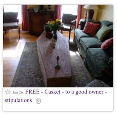 a living room with couches, coffee table and other items on the floor in front of a fire place