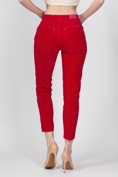 Vintage 80s/90s high waisted red corduroy pants with a tapered leg. Measurements and Condition: Fits like: Labeled size 5, fits modern women's extra small/petite Fabric: Cotton Brand: Bonjour Condition: Very good, with light general wear, and a 1.5" faint dark spot on the right seat (see photos) Waist: 24" Hips: 36" Rise: 10.25" Inseam: 26.75" See our FAQ section for more information on sizing and condition ratings. Red High-waist Corduroy Bottoms, High Waist Red Corduroy Pants, Red Straight Leg Corduroy Bottoms, Red Corduroy Bottoms For Fall, Red Corduroy Bottoms With Pockets, Fitted Red Corduroy Pants, Red Fitted Corduroy Bottoms, Fitted Red Corduroy Bottoms, Red Corduroy Jeans For Fall