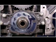 an image of the front end of a car engine with gears and gear on it