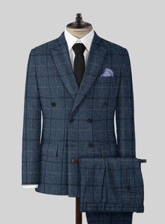 Channel boss vibes everyday with this refined Harris Tweed Gordon Blue Double Breasted Suit to look great in this new season. Crafted from wool, the suit is a stylish piece for your next elegant affair with a shade of blue that will help you charm your way through tedious tasks and an impeccable checks design that carries a timeless appeal. The suit will seamlessly blend together with your favorite shirt to create an eye catching ensemble.  Look Includes   Harris Tweed Gordon Blue Fabric  Double Breasted Jacket Style  Peak Lapel  Horn Royal Black Buttons  Single Vent  Three Cuff Buttons  Two Welted Back Pockets on Trousers   You can change the look during customization if required.   Lining: Viscose, Dry Clean. Blue Double Breasted Suit, Checks Design, Boss Vibes, Peak Lapel, Cheque Design, Double Breasted Jacket, Harris Tweed, Men's Wardrobe, Double Breasted Suit