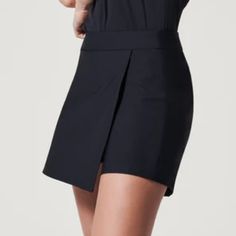 New With Tags Spanx Sunshine Skort, 6 Inseam Very Black 4-Way Stretch Breathable And Quick-Dry Upf 50+ Product Description The Sunshine Skort Is Your New Go-To: Super Cute,Comfy, And A Flattering Fit That Skims Your Body No Shaping Needed!Beach, Boat, And Tee-Time Friendly. Style No. 50300r Size & Fit Hits At Natural Waist For Great Coverage And No Muffin Top Skirt Inseam: 16" Sunshine Short Inseam: 6", Hits Above Mid-Thigh Details Easy, Pull-On Design 4-Way Stretch Chlorine And Saltwater Resist Chic Skort For Workwear With Short Inseam, Black Short Length Bottoms For Office, Elegant Black Shorts For Office, Black Stretch Skort For Work, Fitted Workwear Skort With Short Leg, Casual Office Skort In Short Length, Black Short Skort For Work, Elegant Black Office Shorts, Black Bottoms With Built-in Shorts For Work