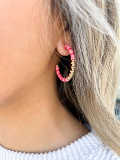 These stylish hoop earrings add a touch of sophistication to any look. Crafted with lead and nickel-compliant metals, these earrings are safe for everyday wear. The unique heishi beading gives them a timeless, fashionable appearance! Pink Pineapple, Metal Ball, Next Clothes, Heishi Beads, Beaded Hoop Earrings, Beaded Hoops, The Pink, Beading, Pineapple