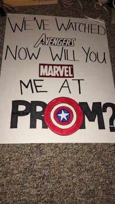 a sign that says, we've watched avengers now will you marry me at prom?