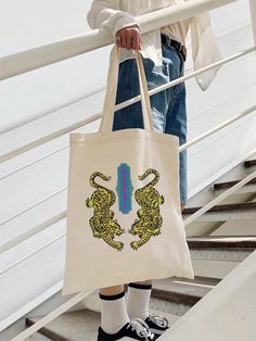 This Seoul South Korea Tiger tote bag is perfect for those who love Korean culture and style. Made from 100% cotton canvas, this durable and heavy fabric tote bag features flat corners, carrying handles, and a sewn-in label. Ideal for anyone looking to add a touch of Korean flair to their daily essentials or as a unique gift for someone who appreciates Korean aesthetics. Perfect for those interested in Korean culture, travelers, students studying abroad, and anyone celebrating Korean holidays or Korean Bag, Korean Holidays, Unique Tote Bag, Fabric Tote Bags, Seoul Korea, Card Bag, Seoul, Festival Season, Cotton Canvas