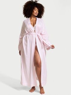 Crafted in our buttery-soft, modal-cotton blend, this classic robe wraps you in cozy comfort, day and night. Wrap robe with tie waist Soft, plant-derived modal fibers, sourced from sustainably managed forests Relaxed fit Flared sleeves Hits at ankle Machine wash Imported Luxury Robes, Lingerie Catalog, Pajama Dress, Loungewear Luxury, Women's Robe, Silk Robe, Womens Robes, Day And Night, Pink Stripes