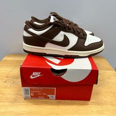 Spruce Up Your Sneaker Collection With These Nike Dunk Low Sneakers. These Sneakers Are Perfect For Various Occasions Including Casual Wear, Activewear, And Workwear. Women’s Us Shoe Size 6 And Uk Shoe Size 3.5 The Sneaker Is Brand New And Authentic, With No Signs Of Wear And Tear. 100% Authentic. Made In Vietnam. In-Hand Ready To Ship. No Major Flaws Seen. Brand New. Please See Pics Above For A Closer Look At Product. Legit Seller. Brown Sneakers With Boost Midsole And Round Toe, Brown Round Toe Skate Shoes, Nike Brown Skate Shoes With Contrast Sole, Nike Brown Leather Skate Shoes, Brown Sneakers With Boost Midsole And Medium Fit, Brown Slip-on Skate Shoes For Streetwear, Nike Brown Sneakers With Contrast Sole, Nike Brown Lace-up Skate Shoes, Brown High-top Sneakers With Translucent Outsole