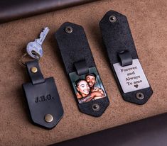 two personalized luggage tags and a keychain with an image of a couple