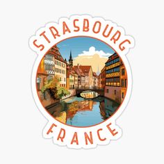 a sticker with the words strasburg france in orange and red on it