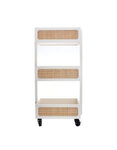 a white shelf with two wicker baskets on it's top and bottom shelves