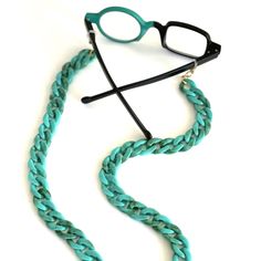 To see all our 85 different colours sunglasses chains please click on the link below. https://www.etsy.com/uk/shop/ChainsAndShades?section_id=37905546 Hand made medium size (15mm links) glasses chain  High quality acrylic chain with gold plated metal ends  Comes with spare rubber rings  Great holder for AirPods and face masks  Sunglasses are not included   It can be worn as a necklace too  Length 70cm approx Adjustable Gold Glass Chain For Glasses, Trendy Summer Glasses Chains With Chain Strap, Trendy Glasses Chains With Chain Strap, Trendy Gold Chain Glasses Chain For Gift, Trendy Gold Chain Glasses Chains As Gift, Trendy Gold Glasses Chain For Gift, Trendy Green Glasses Chains For Beach, Gift Plastic Glasses Chains With Adjustable Chain, Trendy Blue Glass Glasses Chains