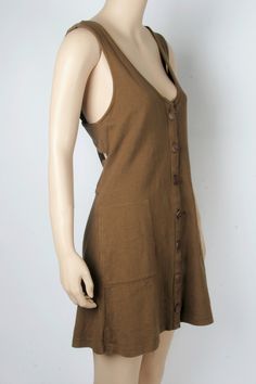 New With Tags Size: Small Color: Army (Brown) Front Button Closure Hip Pockets Dropped Armholes Low Strappy Back Detail Length: 32.5 in Bust: 34 in. Waist: 33.5 in Original Retail $78 100% Cotton Brown Buttoned Summer Dresses, Brown Summer Dresses With Buttons, Brown V-neck Mini Dress With Buttons, Brown V-neck Summer Sundress, Vacation V-neck Sundress With Buttons, V-neck Sundress With Buttons For Vacation, Brown Sleeveless Dress With Buttons, Fitted Buttoned Mini Dress For The Beach, Casual Brown Dress With Buttons