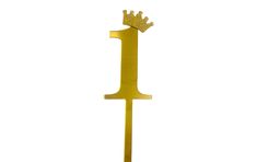 a yellow cake topper with a crown on it's head and a knife in the shape of a letter i