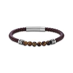 This black leather and tiger's eye beaded bracelet makes a bold fashion statement. Stainless steel This woven leather design features six round tiger's eye beads between two ornate barrel beads 8.5 inches with snap-lock clasp Brown Leather Beaded Bracelets, Brown Beaded Leather Bracelets, Beaded Leather Bracelet With Round Beads, Brown Leather Beaded Bracelets With Round Beads, Leather Bracelets With Round Beaded Details, Leather Bracelet With Round Beaded Details, Casual Brown Leather Beaded Bracelets, Masculine Brown Leather Bracelets, Adjustable Brown Leather Bracelet With Stainless Steel Clasp