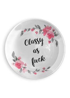 a white bowl with pink flowers and the words classy as fock on it